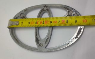 Simbolo Toyota 125x85mm frente traseira usado orig