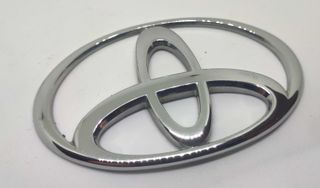 Simbolo Toyota 125x85mm frente traseira usado orig