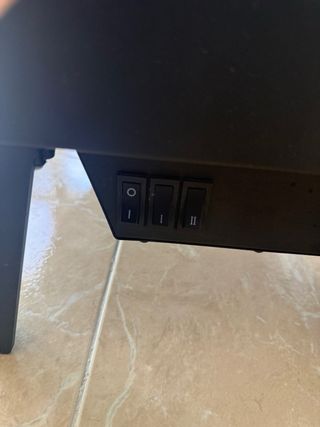 Estufa eléctrica negra con puertas de cristal