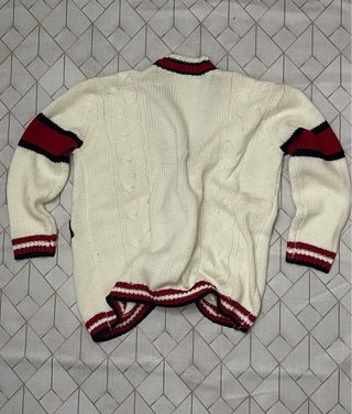 Chaqueta de punto con perros