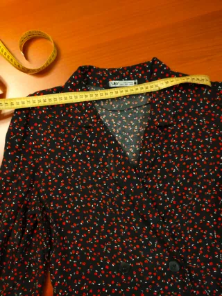 Abito fantasia nero e rosso