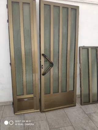2 Ventanas y 1 Puerta Aluminio Marrón