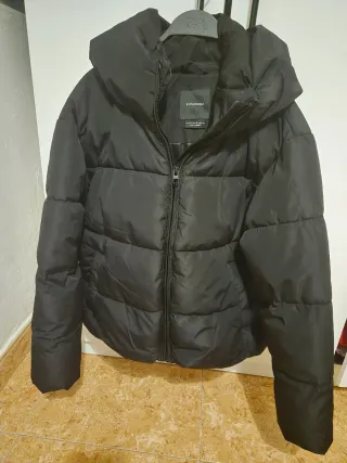 Cappotti invernali beige e nero