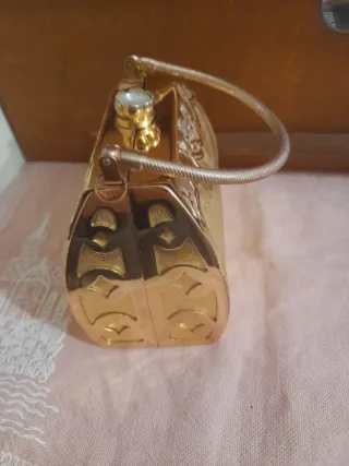 Pochette dorata da donna