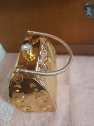 Pochette dorata da donna