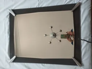 Specchio decorativo con cornice in metallo