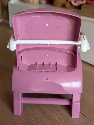 Trona infantil rosa con diseño divertido