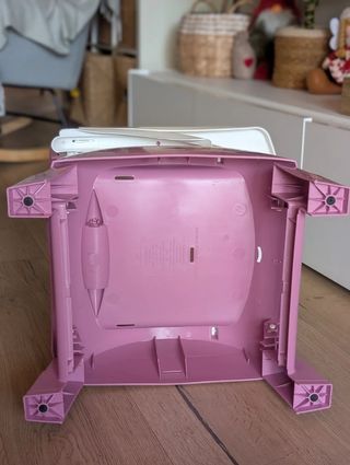 Trona infantil rosa con diseño divertido