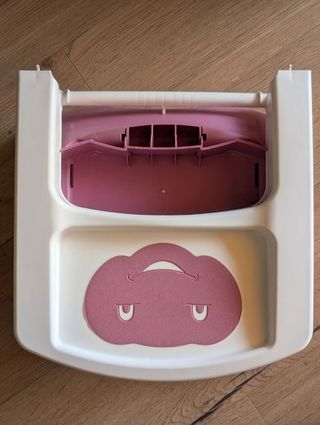 Trona infantil rosa con diseño divertido