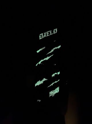 Monopatín Oxelo con lobo que brilla en la oscurida