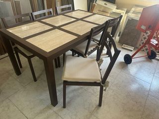 Tavolo da pranzo in metallo e marmo