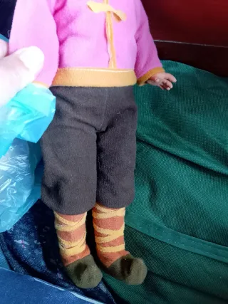 Bambola vintage con vestito rosa