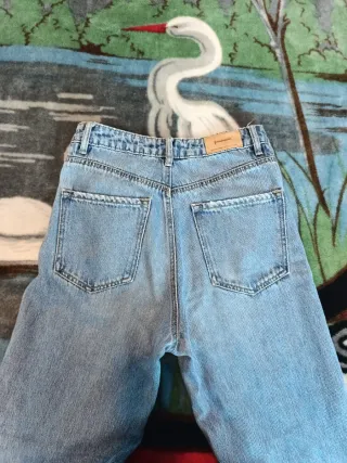 Vaqueros Stradivarius anchos desgastados