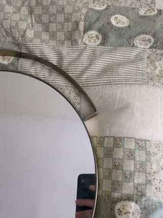 Due specchi rotondi dorati