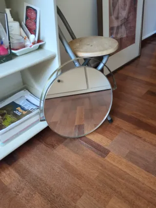 Due specchi rotondi dorati