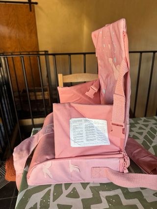 Trona portátil Tuc Tuc rosa poco uso