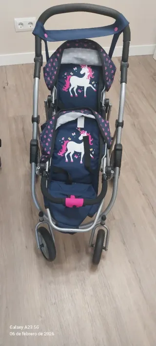 Cochecito de juguete doble con unicornios