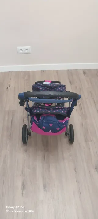 Cochecito de juguete doble con unicornios