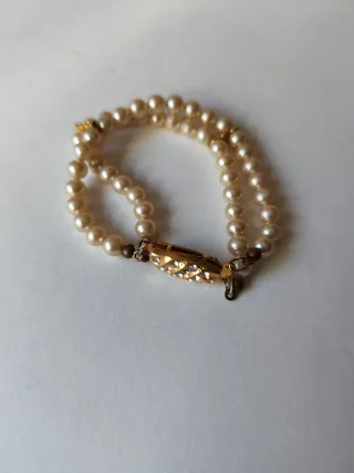 Pulsera doble perlas y cierre dorado
