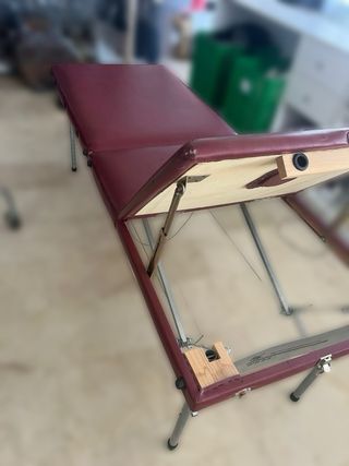 Camilla plegable con funda.