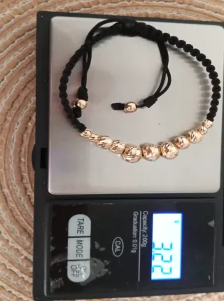 Manilla con balines en Oro 18k