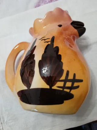 Caraffa vintage in ceramica arancione rosata