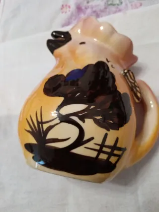 Caraffa vintage in ceramica arancione rosata