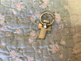 Llavero o colgante en forma de Cruz