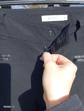 Pantaloni eleganti neri a zampa