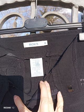 Pantaloni eleganti neri a zampa