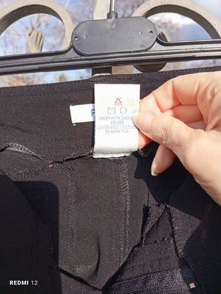 Pantaloni eleganti neri a zampa