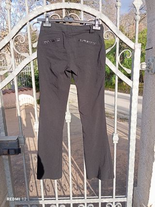 Pantaloni eleganti neri a zampa