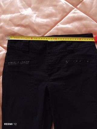 Pantaloni eleganti neri a zampa