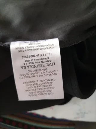 Falda símil ante negra