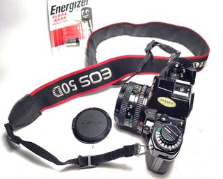 Canon A-1 + Lente FD 50mm 1:1.8