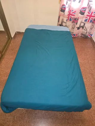 Cama con somier tapizado