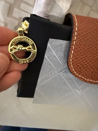 Mala de mão preta e castanha