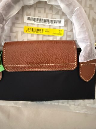 Mala de mão preta e castanha