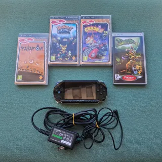 PSP Negra + 4 Juegos + Cargador