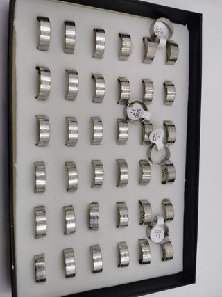 Lote 6 cajas anillos acero para reventa