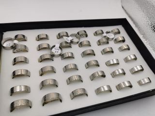 Lote 6 cajas anillos acero para reventa