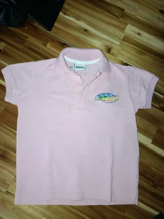 Polo rosa infantil con parche