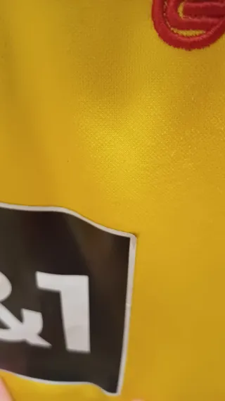 Conjunto chándal Puma hombre amarillo y negro