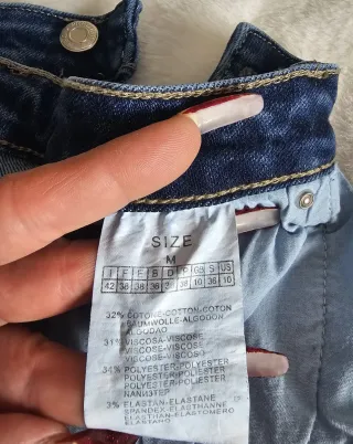 Pantalones vaqueros desgastados azules