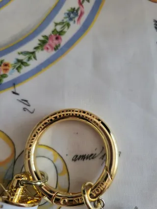 Llavero copo de nieve dorado y blanco