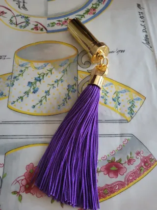 Llavero copo de nieve dorado y blanco