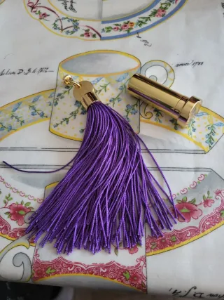 Llavero copo de nieve dorado y blanco