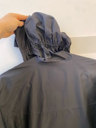 Giacca a vento Salewa nera con zip arancione