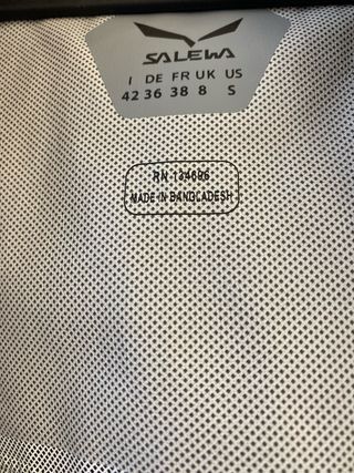 Giacca a vento Salewa nera con zip arancione