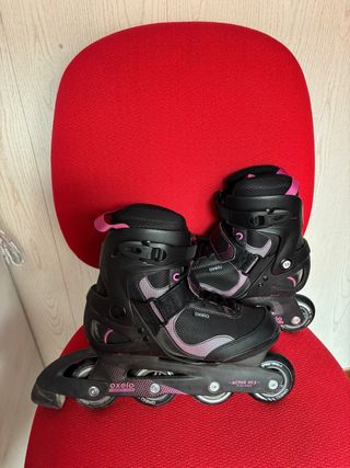 Par de patines negro-rosa y turquesa-gris
